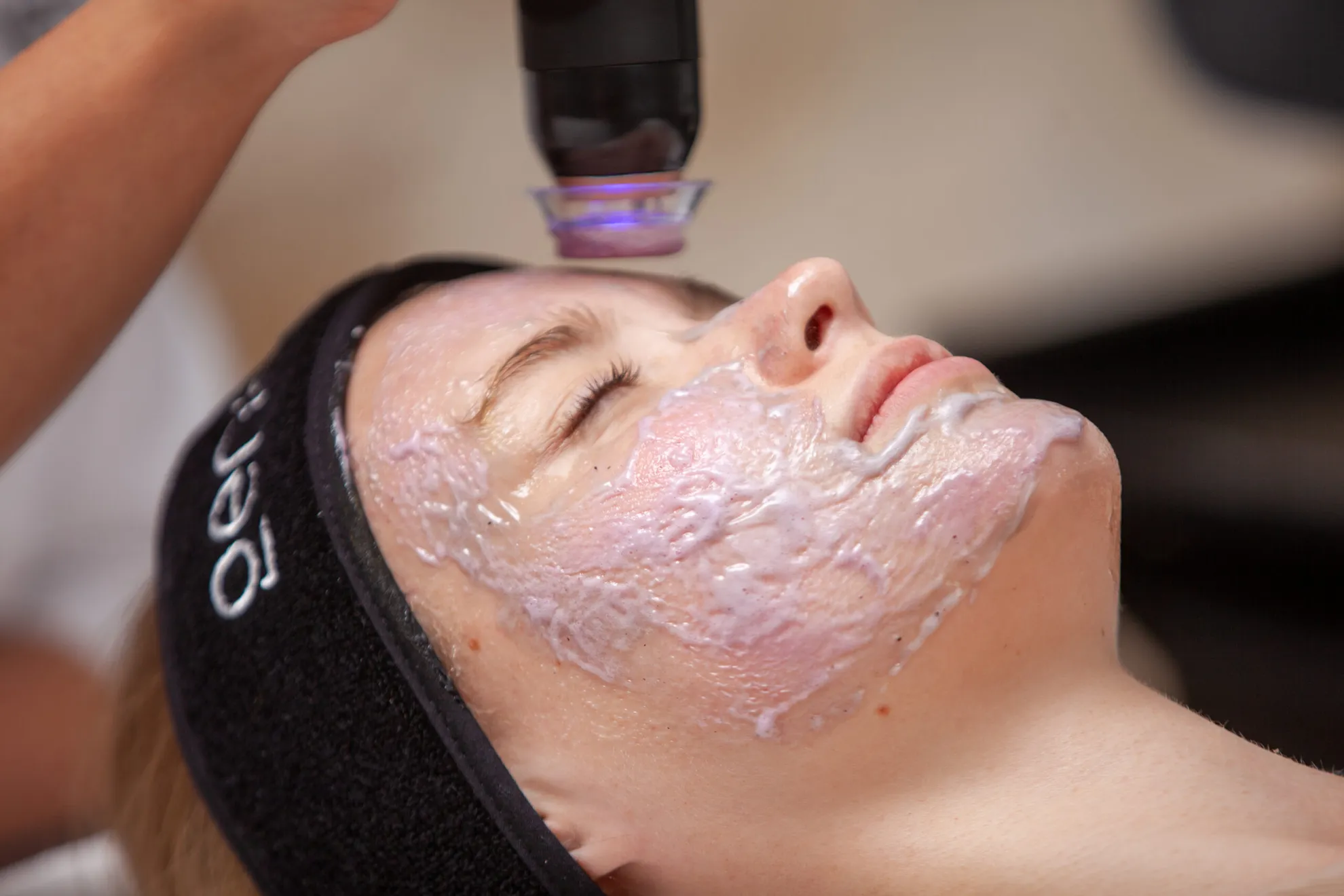 Client getting the Geneo X facial hertfordshire